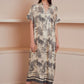 loose-fitting midi dress with short sleeves.