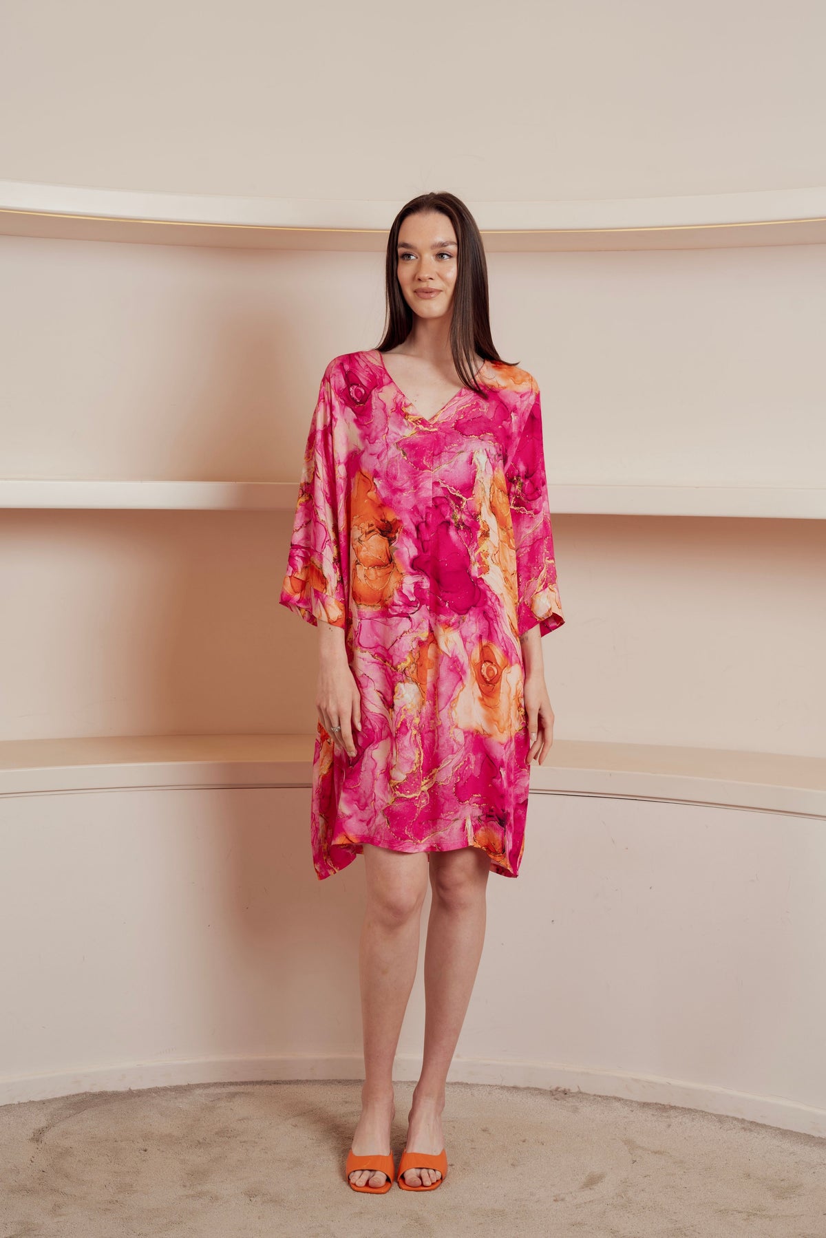 Pink and orange abstract floral dress.