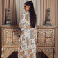 A stylish open-front kaftan featuring a geometric print in earthy tones