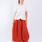 VOLUMINOUS MIDI SKIRT